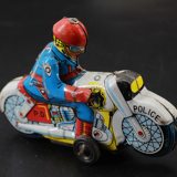 Ancien jouet moto en tôle japonais