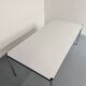 Large table design USM Haller with a white top and chrome structure.