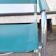 Fauteuil cantilever en métal chromé et cuir vert