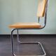 Marcel Breuer tubular frame chair with rattan seating, 70