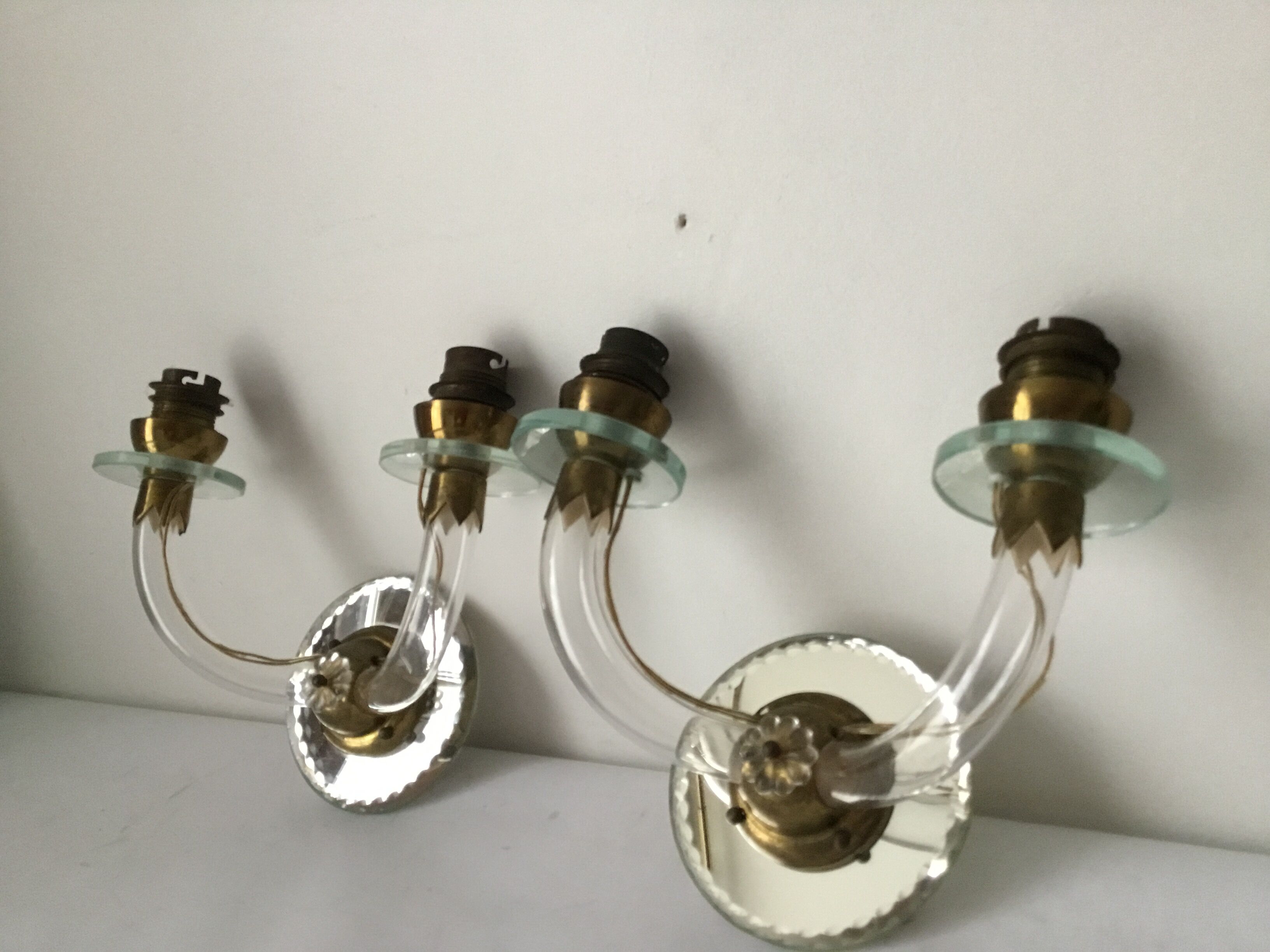 Pair of glass and mirror sconces