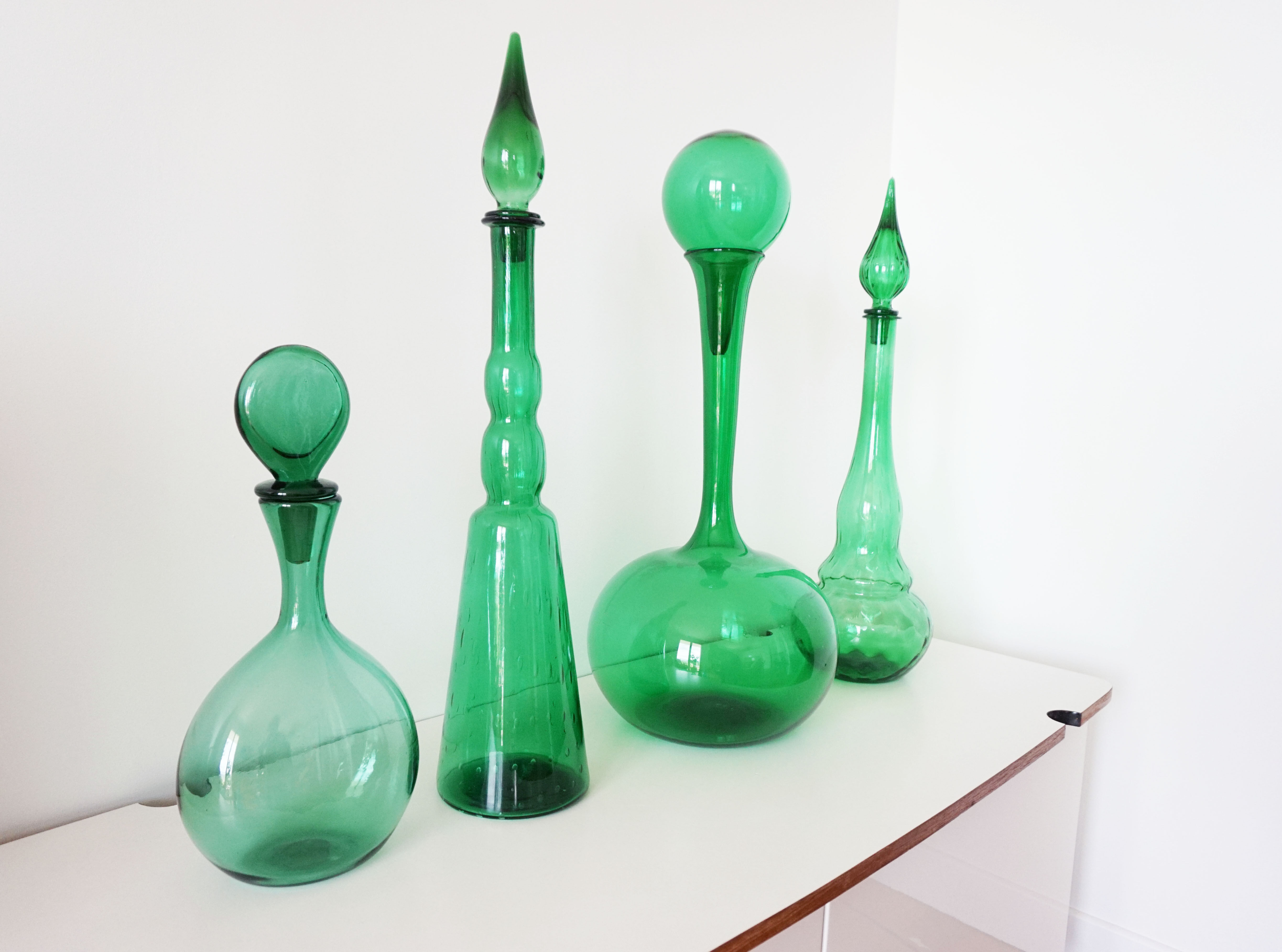 Italian bottle or decanter in green blown glass empoli