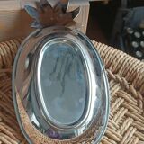 Silver-plated metal tray in the shape of a pineapple.