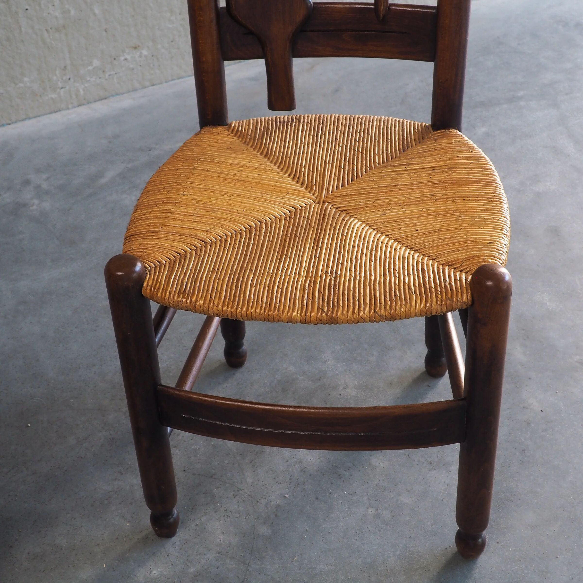 2 sculptural brutalist high-back chairs
