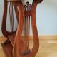 Pedestal table or English cherry saddle with lyre feet