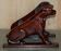 Pair of hardwood library steps with carved dogs, Regency style.