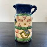 Handcrafted pitcher with graphic patterns
