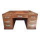 Large modernist minister's desk in solid lemon wood with 7 drawers.