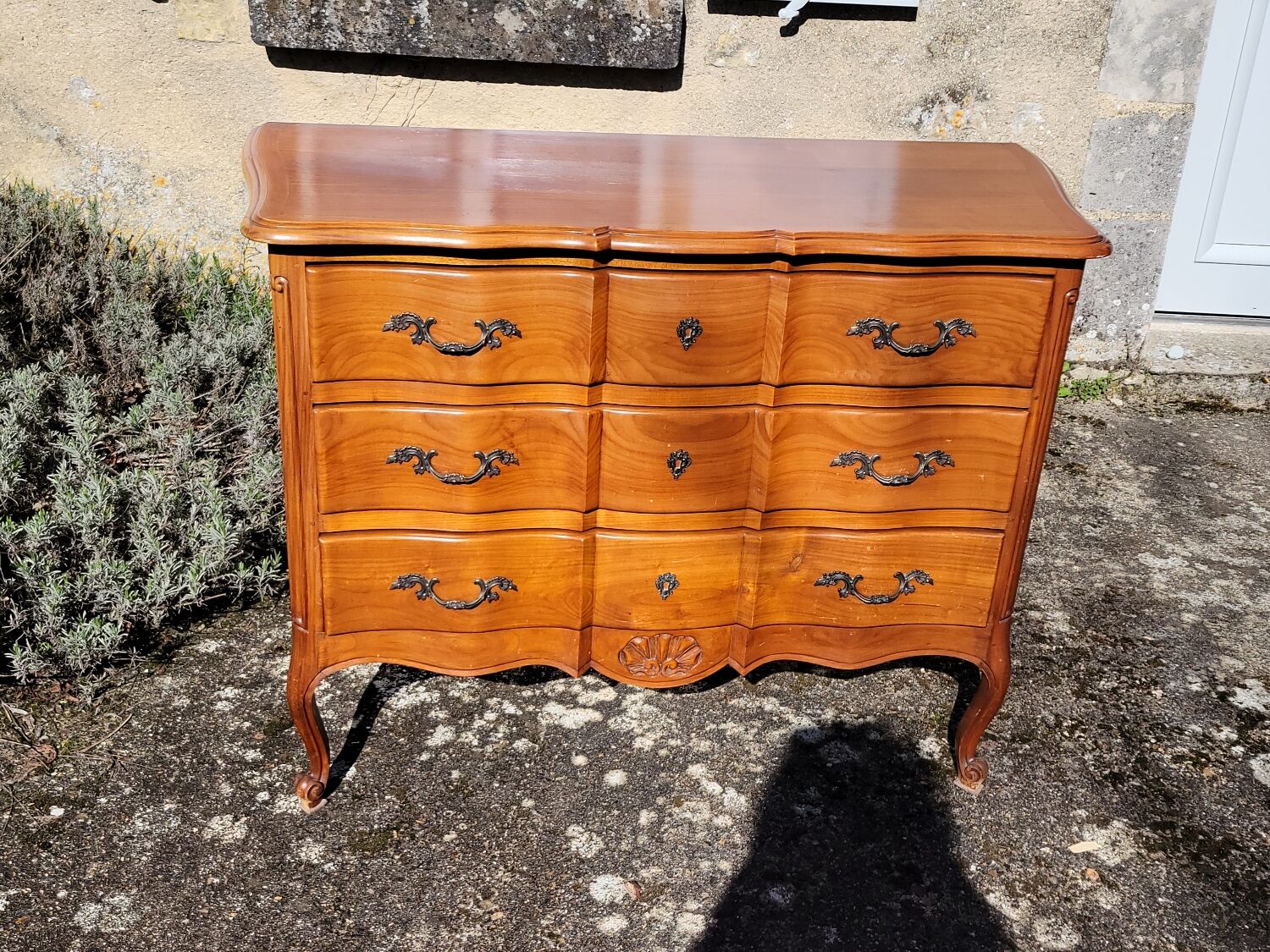 Louis XV style crossbow commode in cherry wood