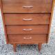 Chest of drawers of the 50s in rosewood spindle feet and fins