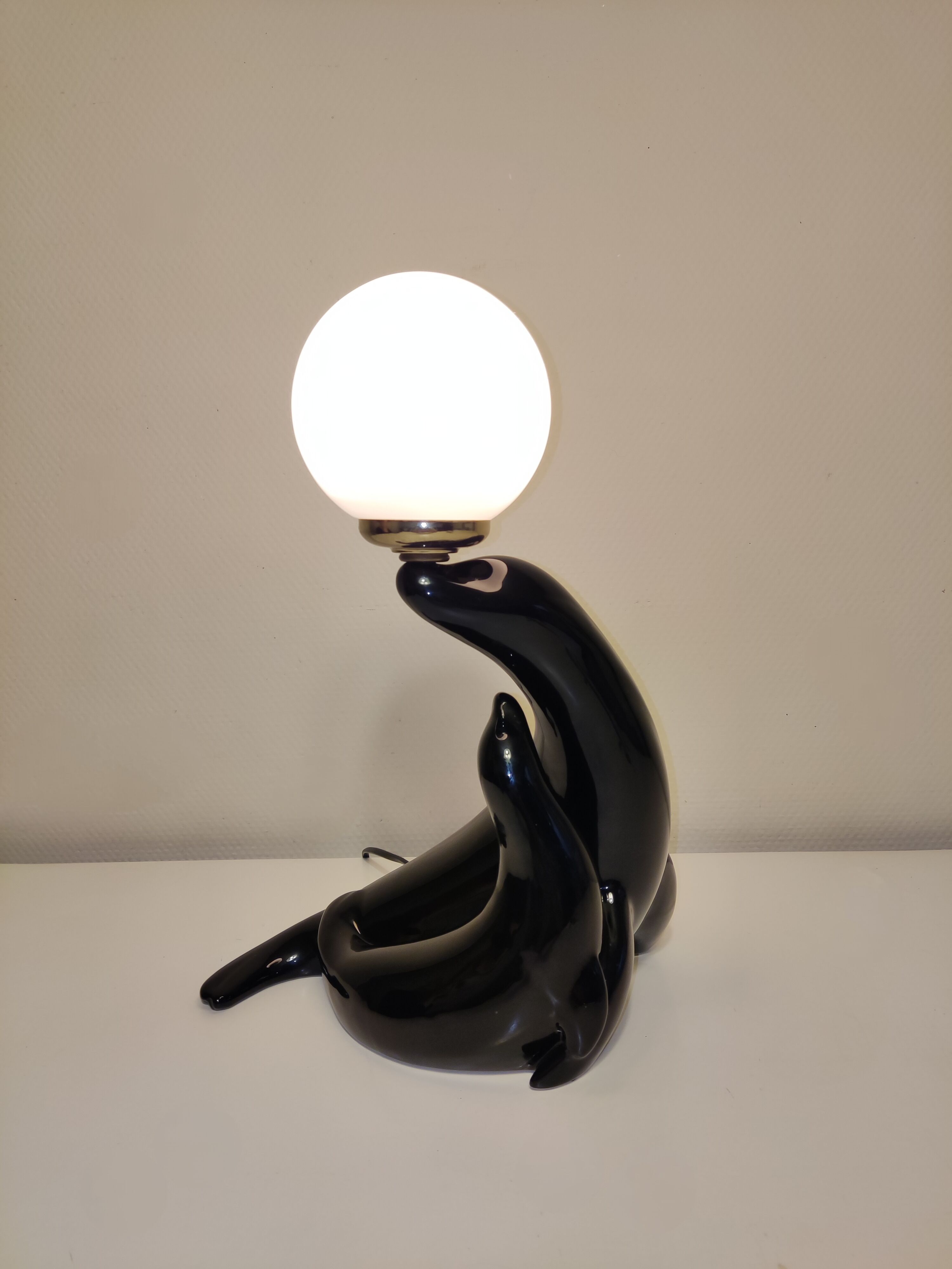 Sea lion lamp with its small ceramic