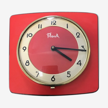 Horloge de cuisine en formica rouge