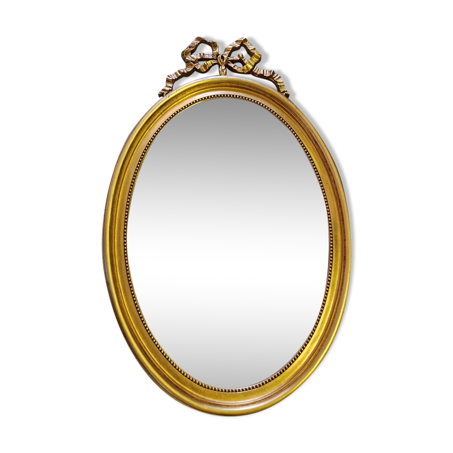 Vintage oval bow tie mirror