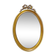Vintage oval bow tie mirror