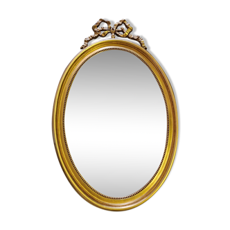 Vintage oval bow tie mirror