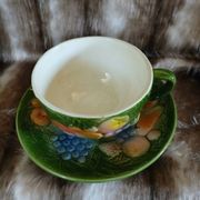 Tasse + soucoupe anciennes en barbotine