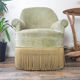 Fauteuil crapaud en velours vert pistache vintage