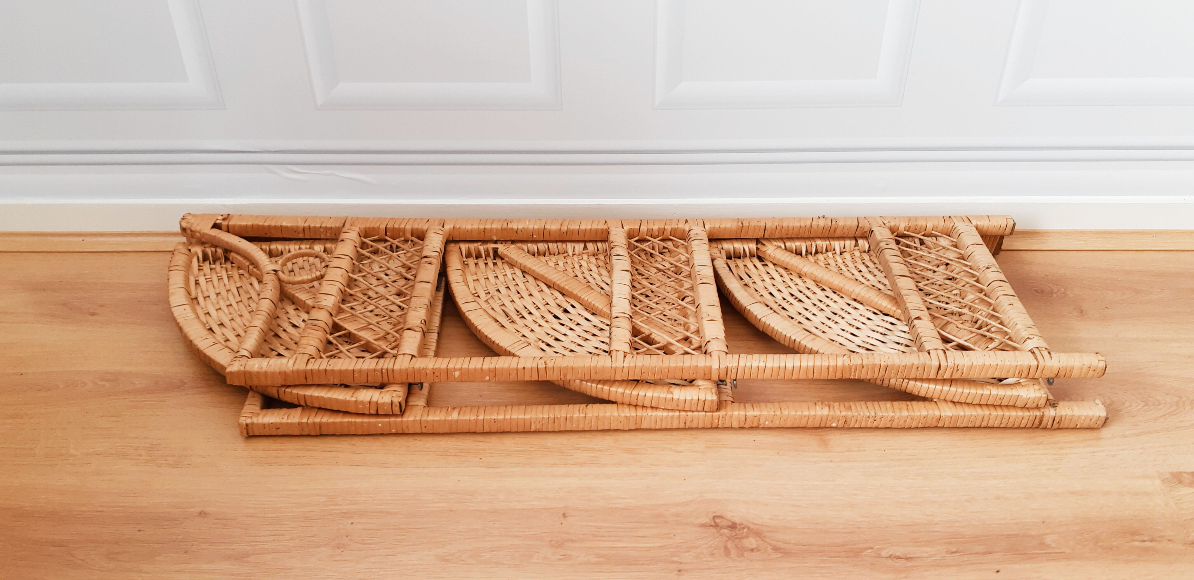 Rattan corner shelf