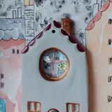 Relief composition of a city landscape inspired by old Lyon