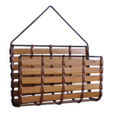 Vintage wall-mounted magazine rack