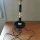 Vintage lamp base in black leather and brass