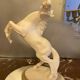 White rearing horse statuette