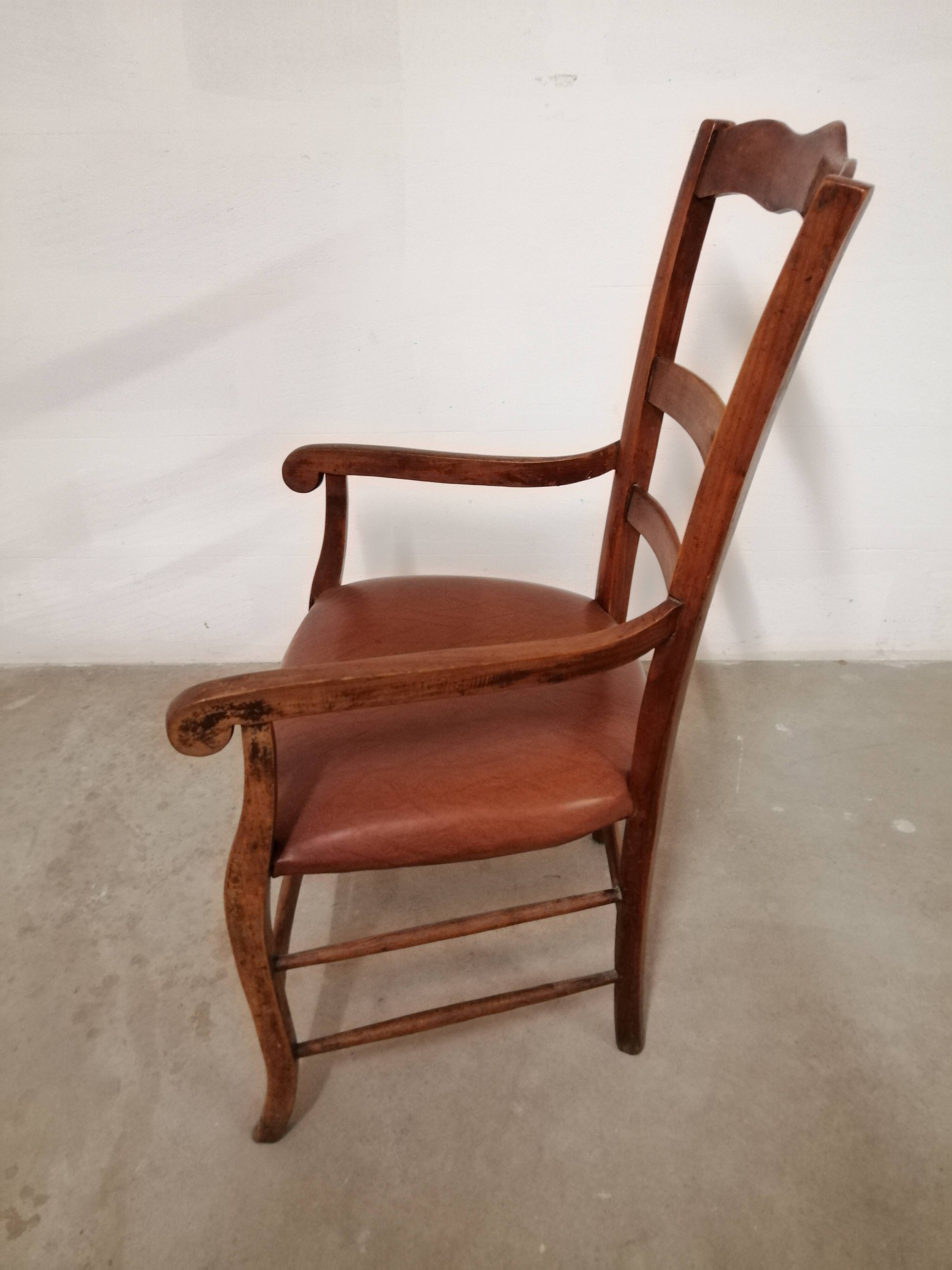 Solid wood and imitation leather armchair