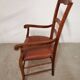 Solid wood and imitation leather armchair