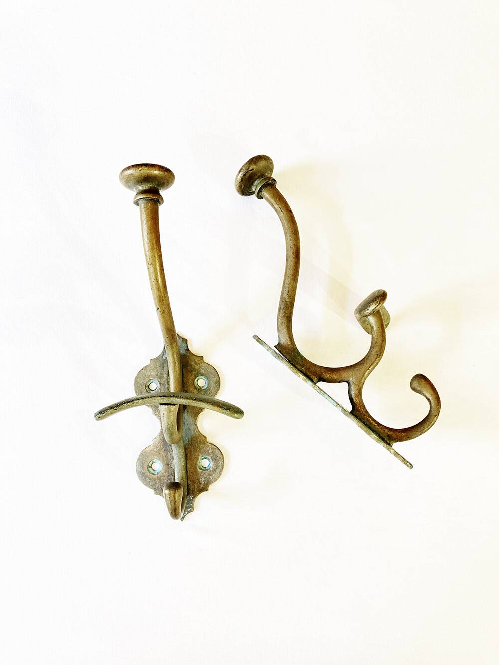 Antique patinated brass coat hooks