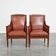 Majestic, luxurious set of 2 cognac-colored cowhide leather Art Deco design armchairs