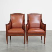 Majestic, luxurious set of 2 cognac-colored cowhide leather Art Deco design armchairs