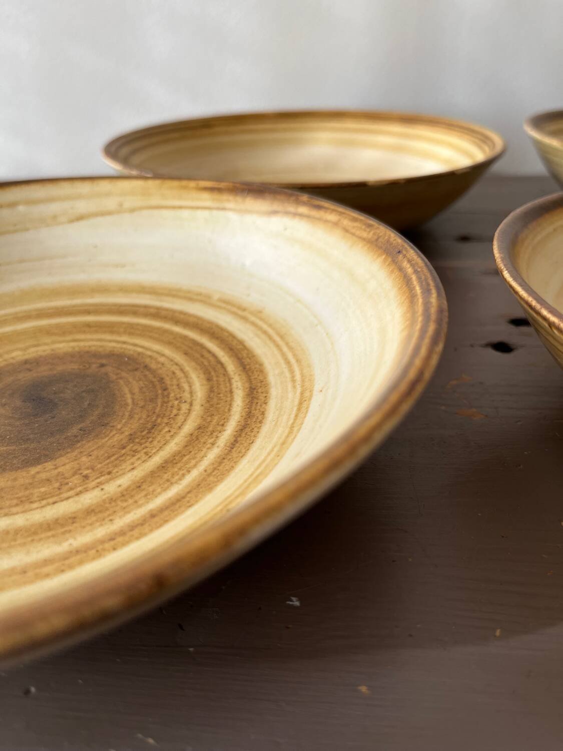 Lot de 4 assiettes creuses signées Longchamp