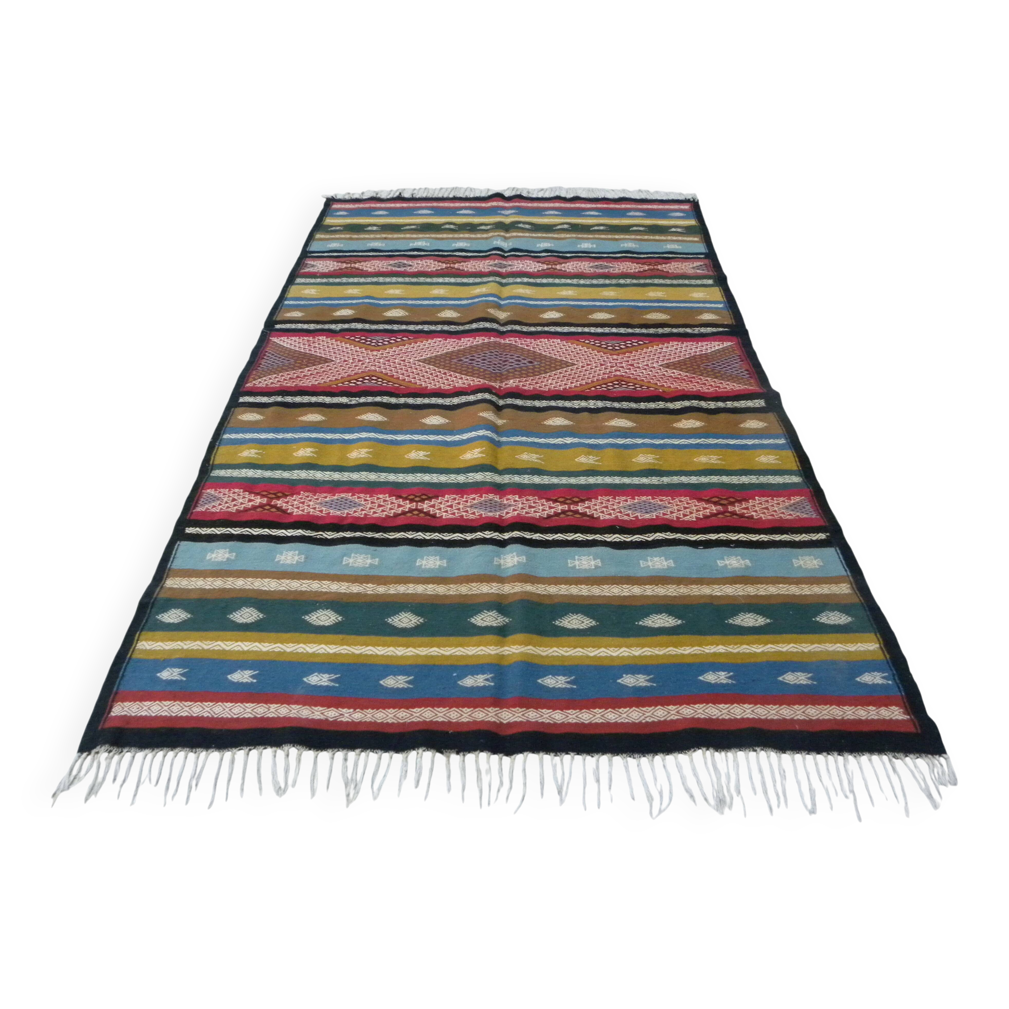 Traditional Berber tribal kilim rug with multicoloured geometric patterns.