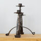 Pair of wrought iron candle holders, 60s