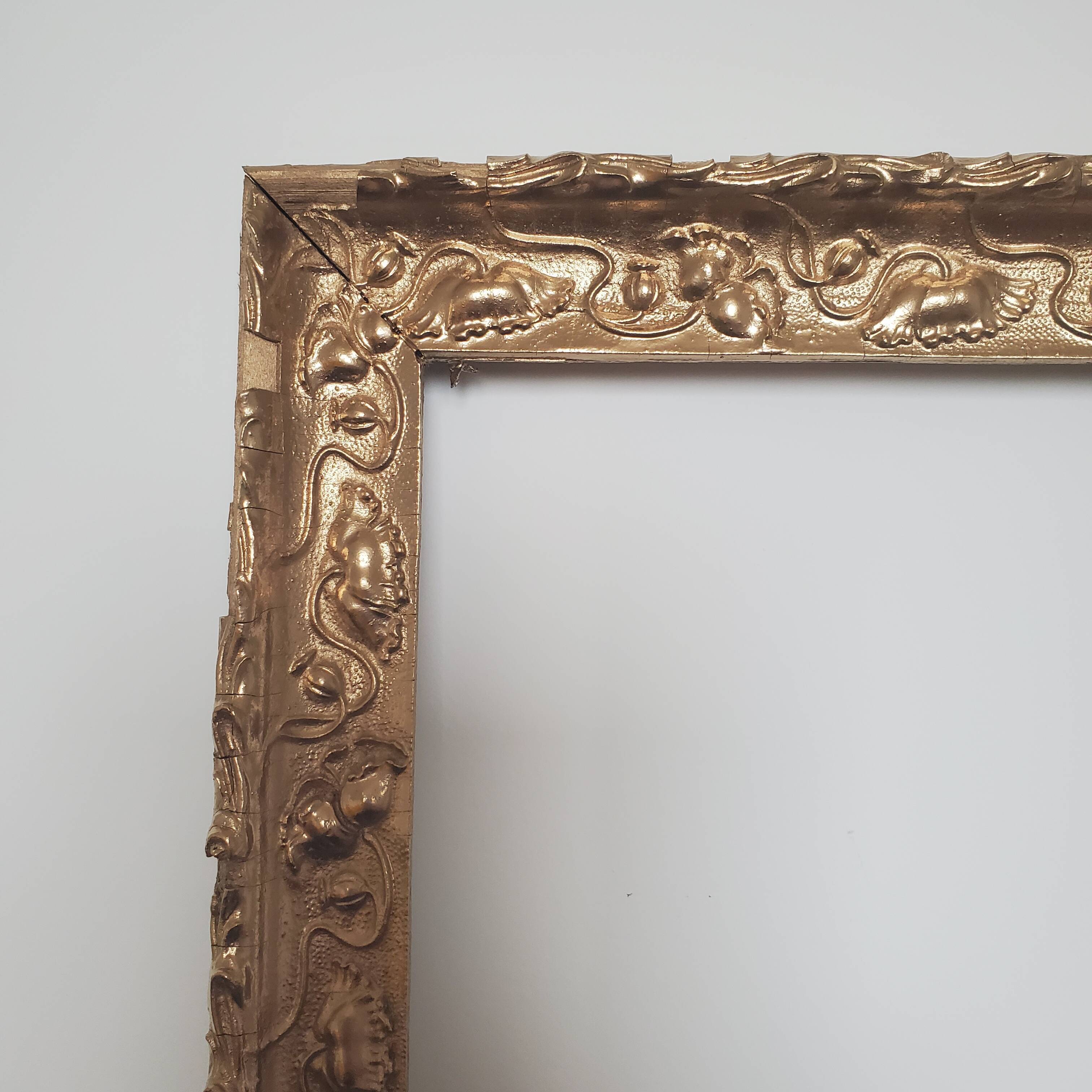 Large old gilded wooden frame