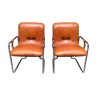 Pair of gold leather armchairs 70'