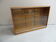 Vintage shop display cabinet with sliding doors