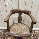 Fauteuil de coiffeur en cannnage Paul Tournay