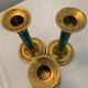 Trio of vintage bronze candle holders