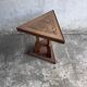 Triangular side table in carved wood, Art Nouveau, France, circa 1915.