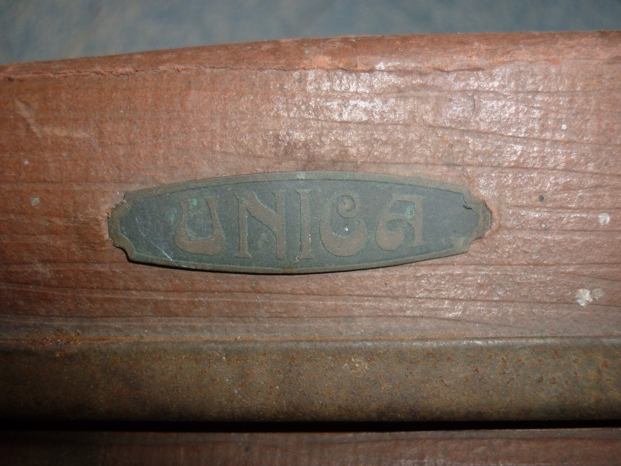 Unica red-haired suitcase