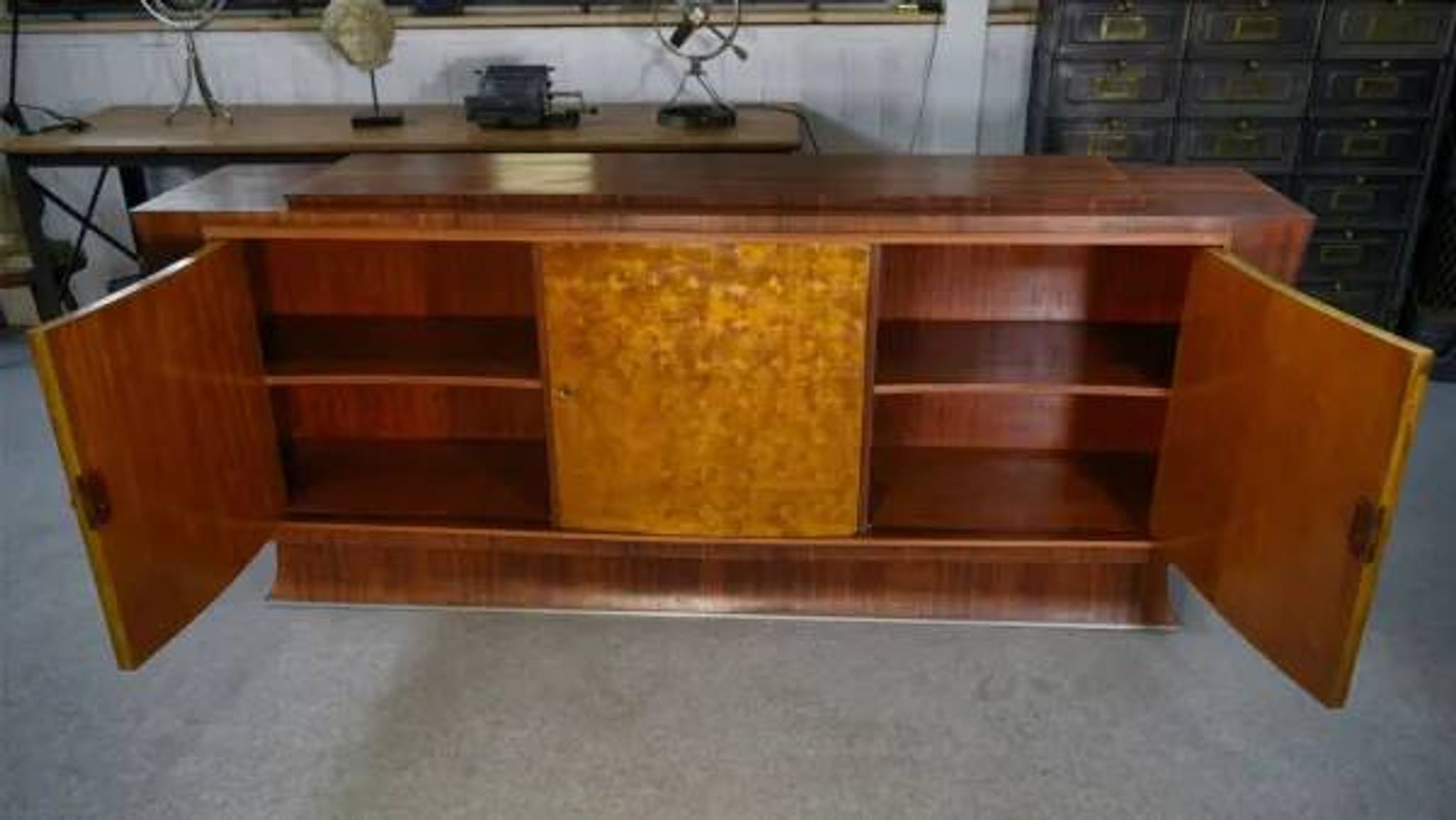 Art Deco rosewood sideboard with gilt door, attributed to Maison Dominique, 1940s