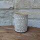 Old terracotta mug with glazed interior
