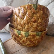 Old set of bowls and spoons in the shape of vintage pineapple