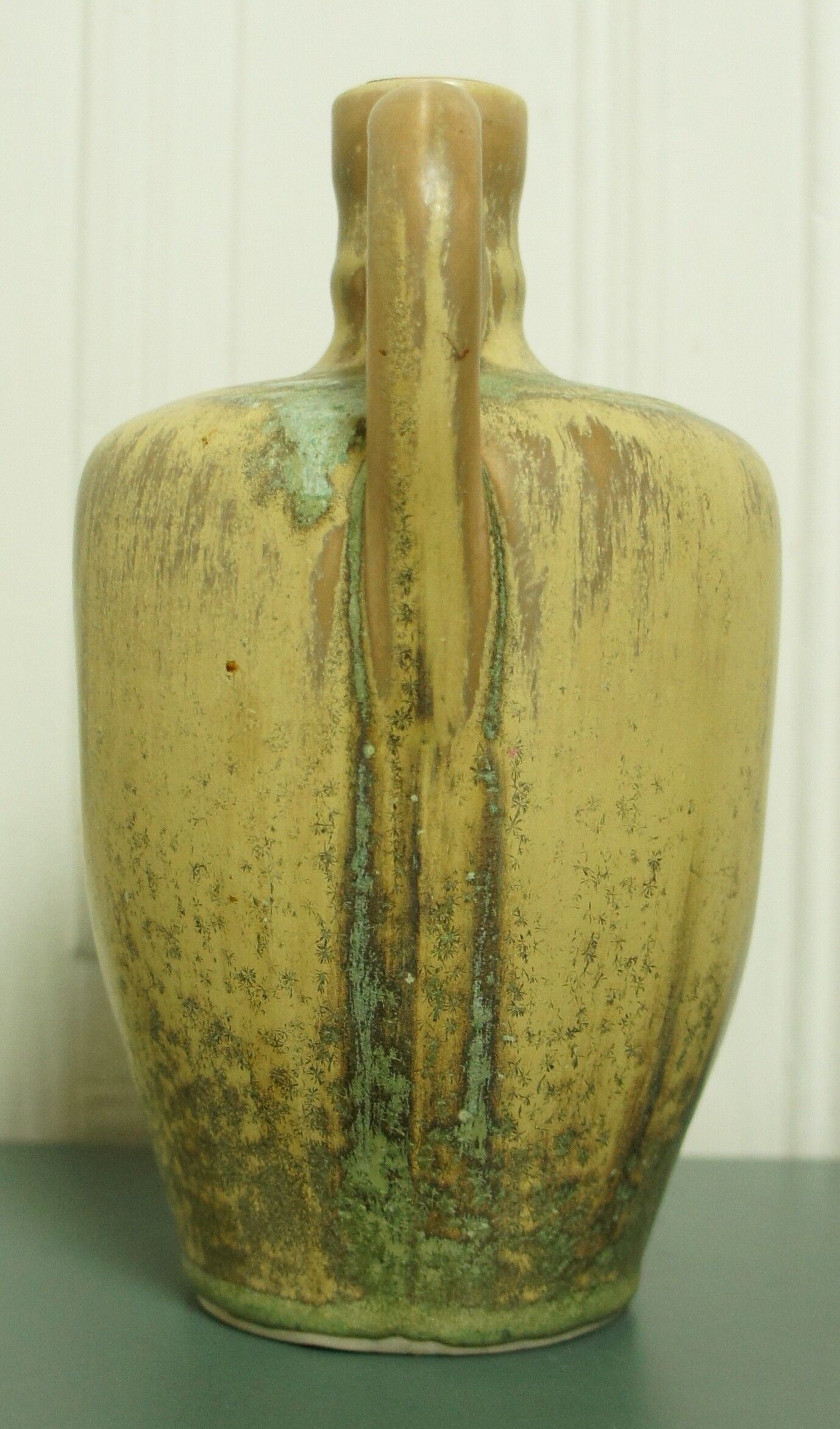 Glazed porcelain pitcher