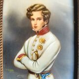 Pair of miniature portraits on ivory signed