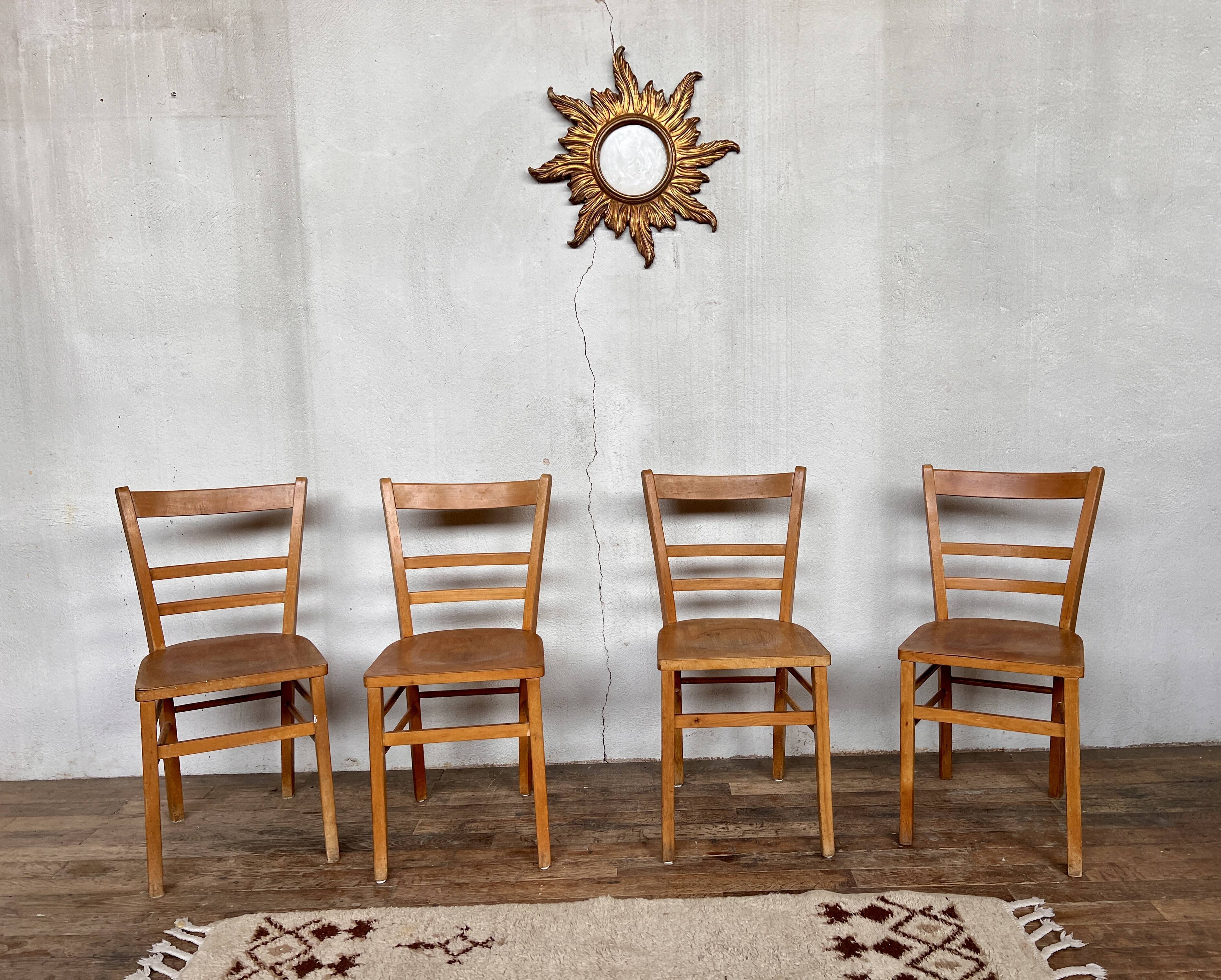 Series of 4 vintage light wood bistro chairs