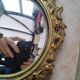Pair of antique witch mirrors, curved glass, bronze frame