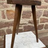 Brutalist rustic tripod farm stool made of vintage wood