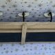 Wall-mounted coat rack with porcelain hooks
